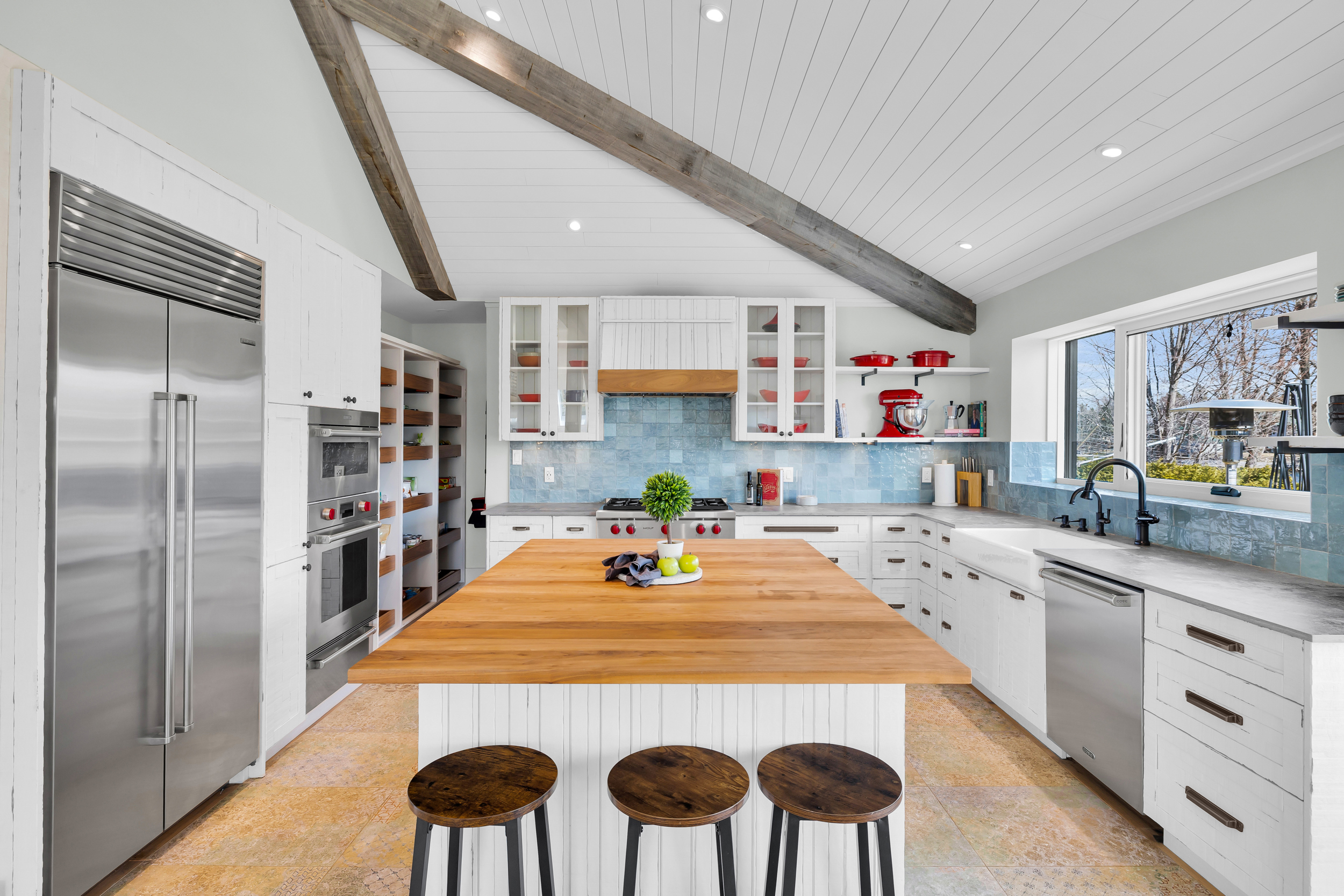 Farmhouse kitchen with exposed wood beams