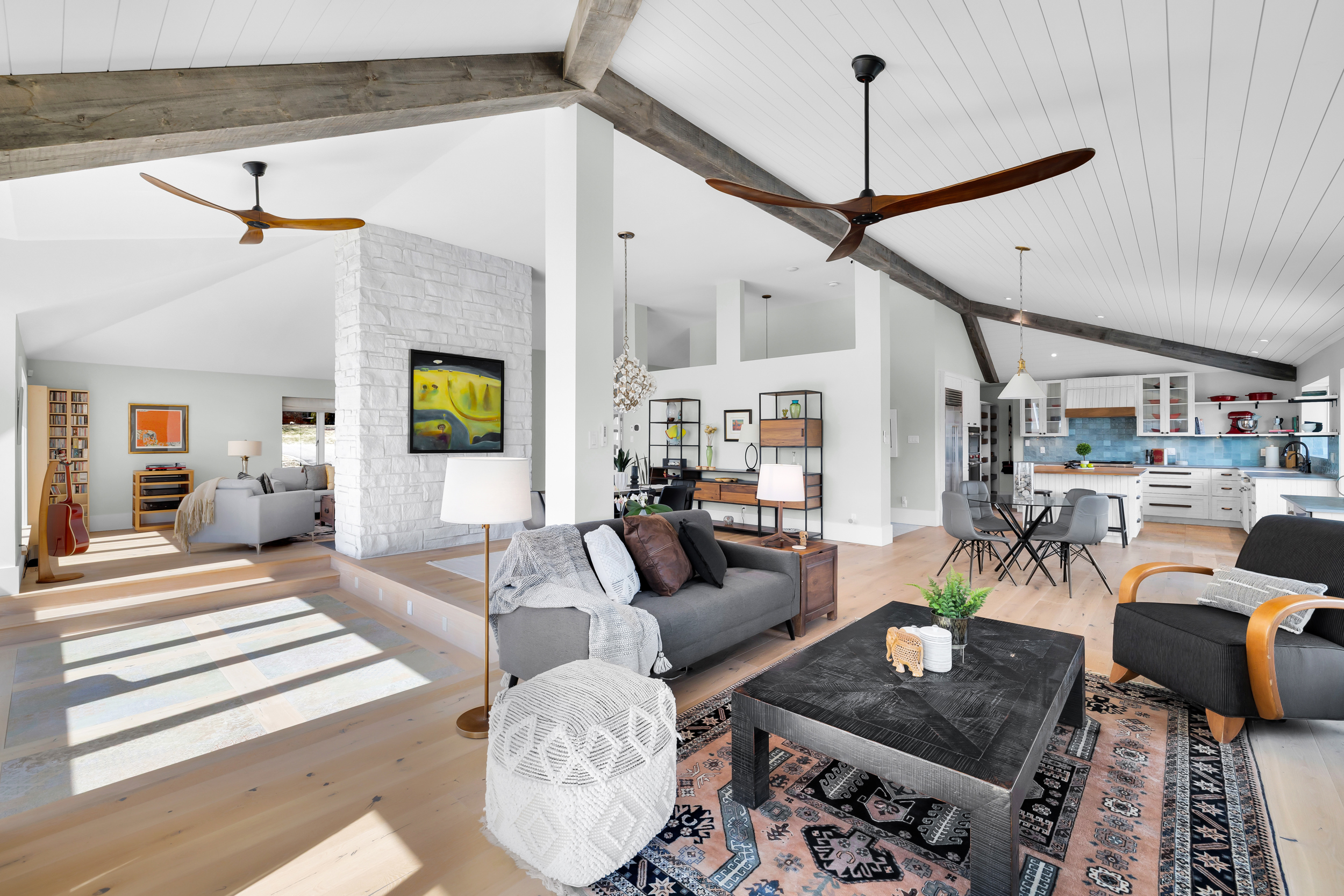 Vaulted beam ceiling open-concept living space