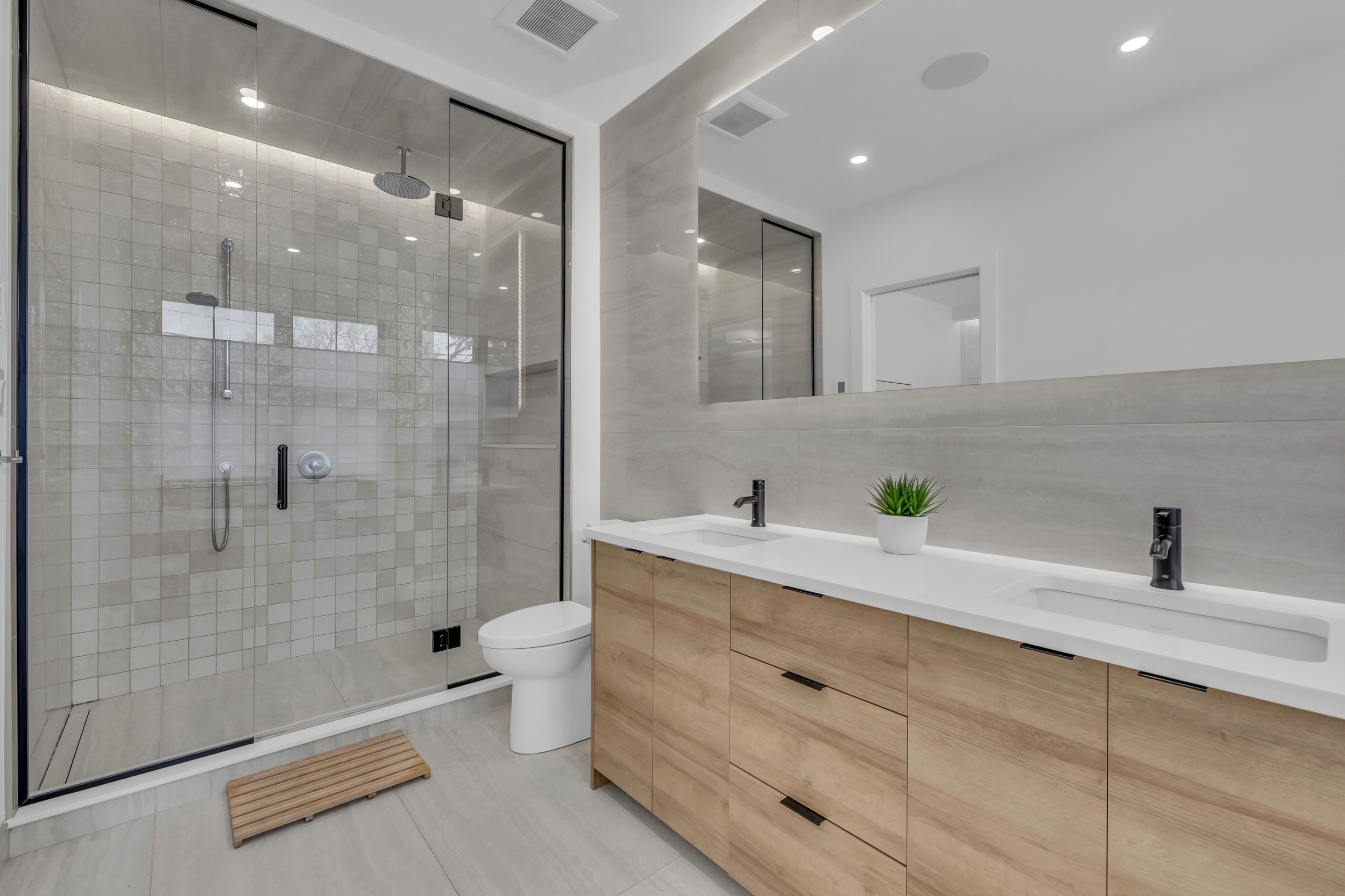 Spa-style master bathroom with freestanding tub